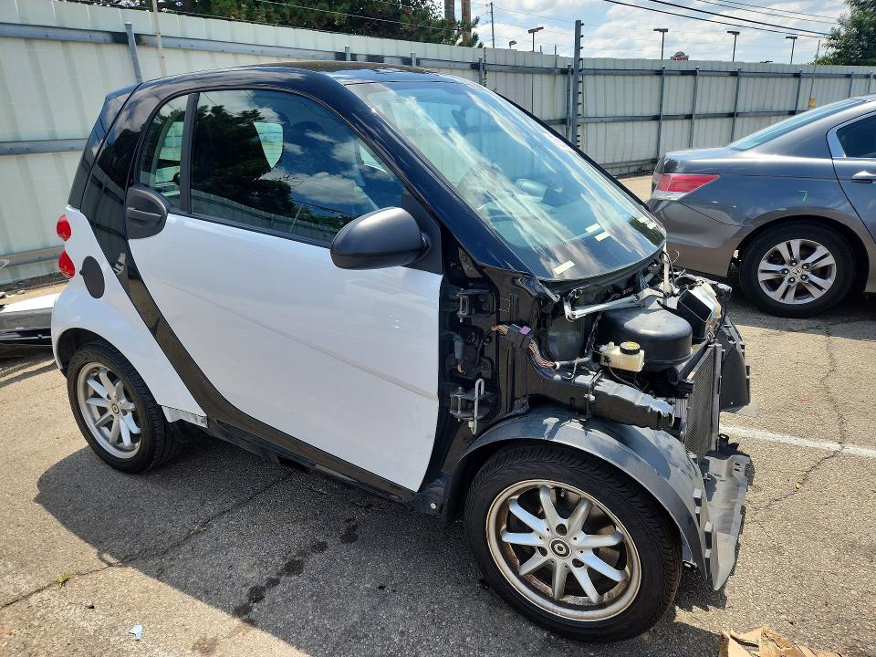 2009 Smart Fortwo VIN WMEEJ31X59K216963 COPART salvage auction — FRONT END, OH - CERT OF TITLE-SALVAGE, sold $450 on 2026-09-09 (photo 4)