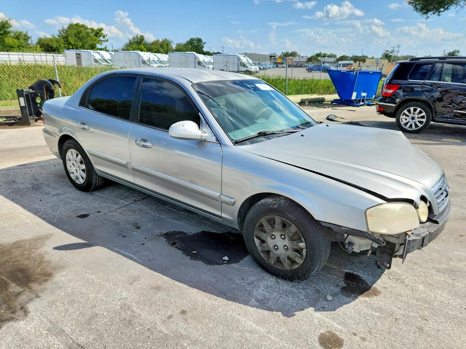 2005 Kia Optima VIN KNAGD126555383175 COPART salvage auction — FRONT END, FL - CERT OF TITLE SLVG REBUILDABLE, sold $15 on 2026-07-21 (photo 4)