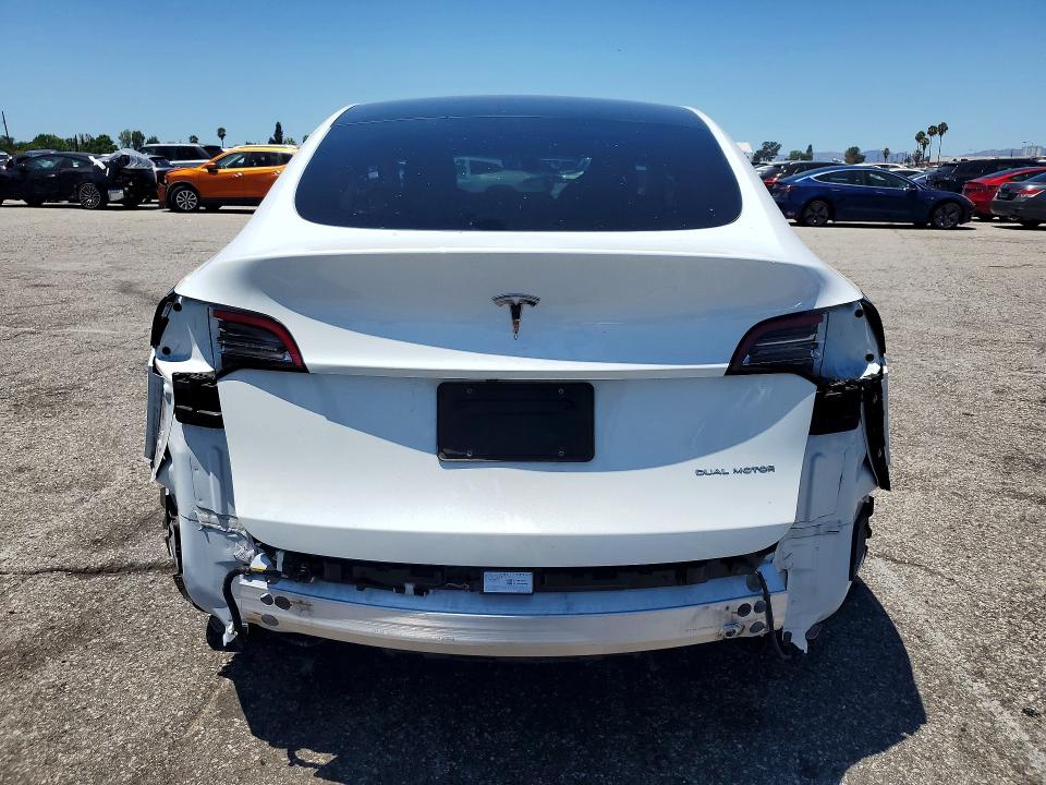 2022 Tesla Model y VIN 7SAYGAEE9NF465526 COPART salvage auction — SIDE, Ca - Salvage Certificate, sold $8,200 on 2026-08-28 (photo 6)