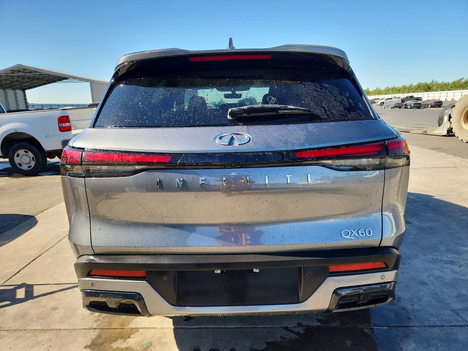 2025 Infiniti Qx60 VIN 5N1AL1FRXSC345072 COPART salvage auction — MINOR DENT/SCRATCHES, Tx - Dis/Dlr/Exp Only Clean Title (P), sold $8,500 on 2026-07-23 (photo 6)