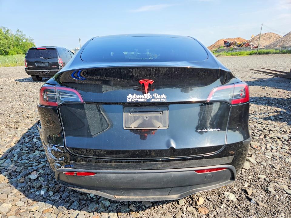 2023 Tesla Model y VIN 7SAYGDEE8PA174422 COPART salvage auction — FRONT END, Ny - Certificate Of Title, sold $1,150 on 2026-07-21 (photo 6)