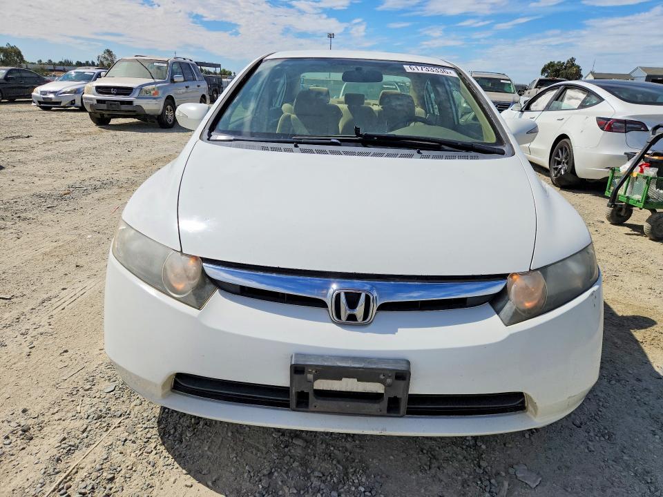 2006 Honda Civic hybrid VIN JHMFA36276S012983 COPART salvage auction — MINOR DENT/SCRATCHES, Ca - Dis/Dlr/Exp Only Clean Title, sold $375 on 2026-07-30 (photo 5)