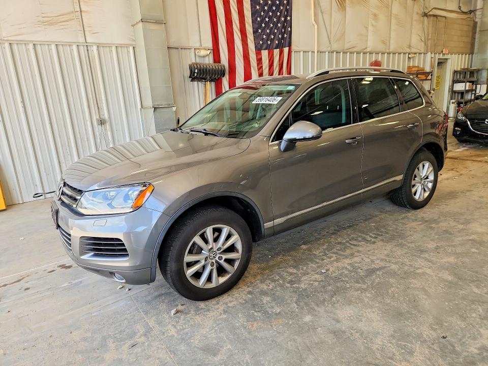 2014 Volkswagen Touareg VIN WVGEF9BP9ED004241 COPART salvage auction — HAIL, Wi - Certificate Of Title, sold $200 on 2026-07-28 (photo 1)