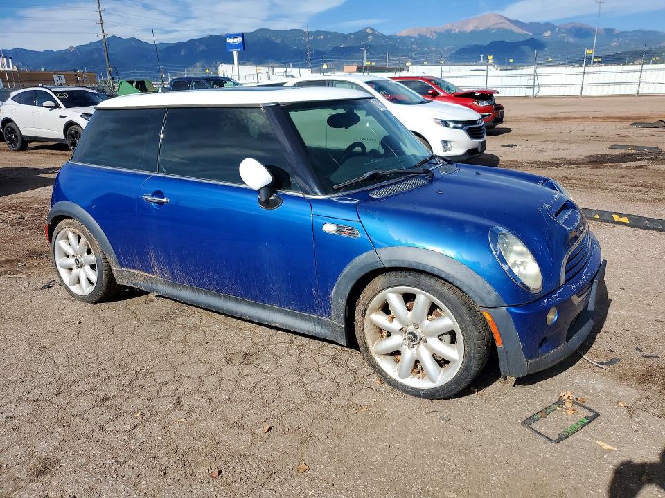 2006 Mini Cooper VIN WMWRE33546TJ35780 COPART salvage auction — MINOR DENT/SCRATCHES, CO - DIS/DLR/EXP ONLY CLEAN TITLE, sold $275 on 2026-08-05 (photo 4)