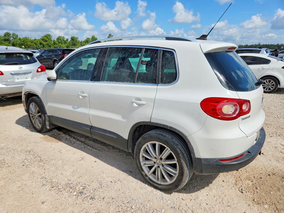 2009 Volkswagen Tiguan VIN WVGBV75N39W521811 COPART salvage auction — NORMAL WEAR, TX - CERT OF TITLE-REBUILT SALVAGE, sold $825 on 2026-07-14 (photo 2)