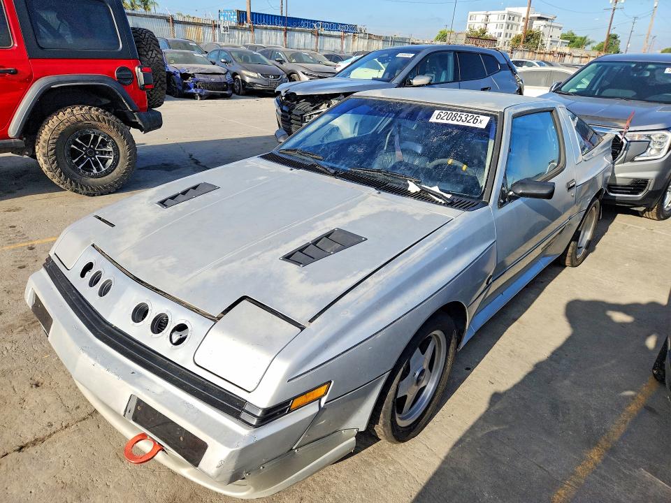 1987 Mitsubishi Starion VIN JA3CC54N1HZ031447 COPART salvage auction — REAR END, Ca - Dis/Dlr/Exp Only Lien Papers, sold $1,350 on 2026-07-27 (photo 1)