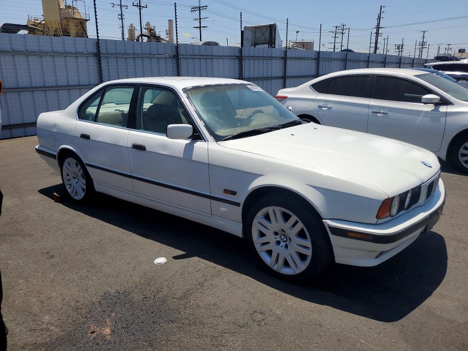 1995 BMW 5 series VIN WBAHD5323SGB37770 COPART salvage auction — MINOR DENT/SCRATCHES, Ca - Dis/Dlr/Exp Only Clean Title, sold $550 on 2026-07-27 (photo 4)