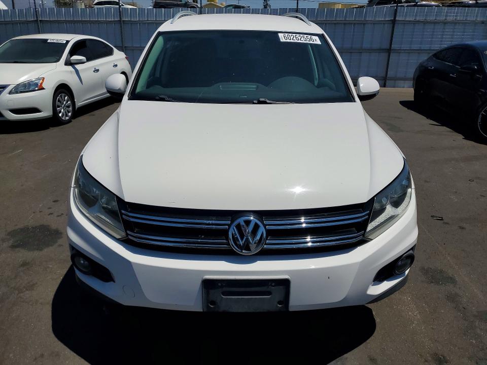 2012 Volkswagen Tiguan VIN WVGAV7AX5CW606224 COPART salvage auction — MINOR DENT/SCRATCHES, Ca - Dis/Dlr/Exp Only Clean Title (P), sold $600 on 2026-07-22 (photo 5)