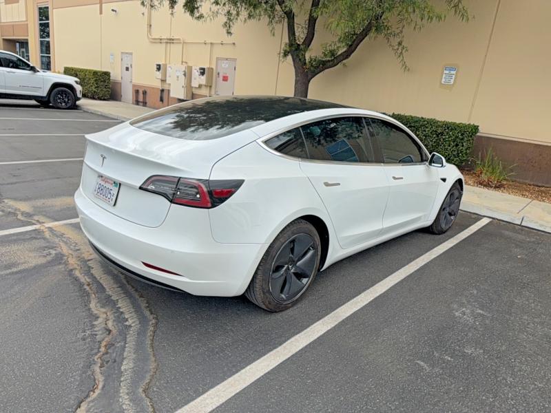 2020 Tesla Model 3 VIN 5YJ3E1EA3LF799963 COPART salvage auction — NORMAL WEAR, Ca - Dis/Dlr/Exp Only Clean Title (P), sold $9,400 on 2026-07-30 (photo 4)