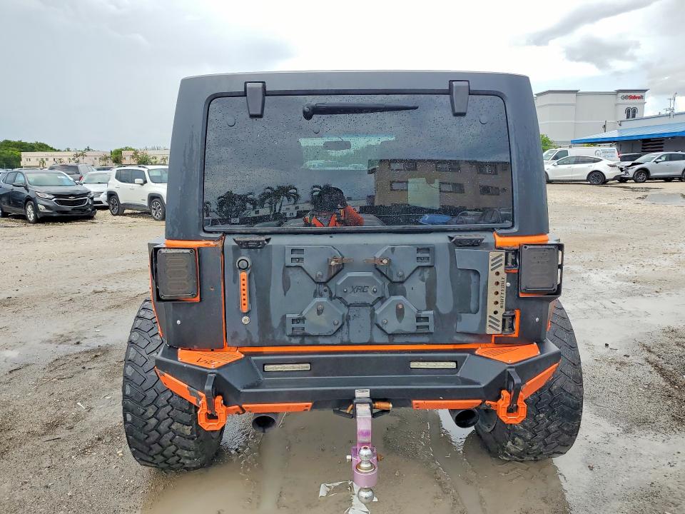 2013 Jeep Wrangler / VIN 1C4BJWDG3DL521444 COPART salvage auction — FRONT END, Fl - Cert Of Title-Rebuilt, sold $4,300 on 2026-07-10 (photo 6)