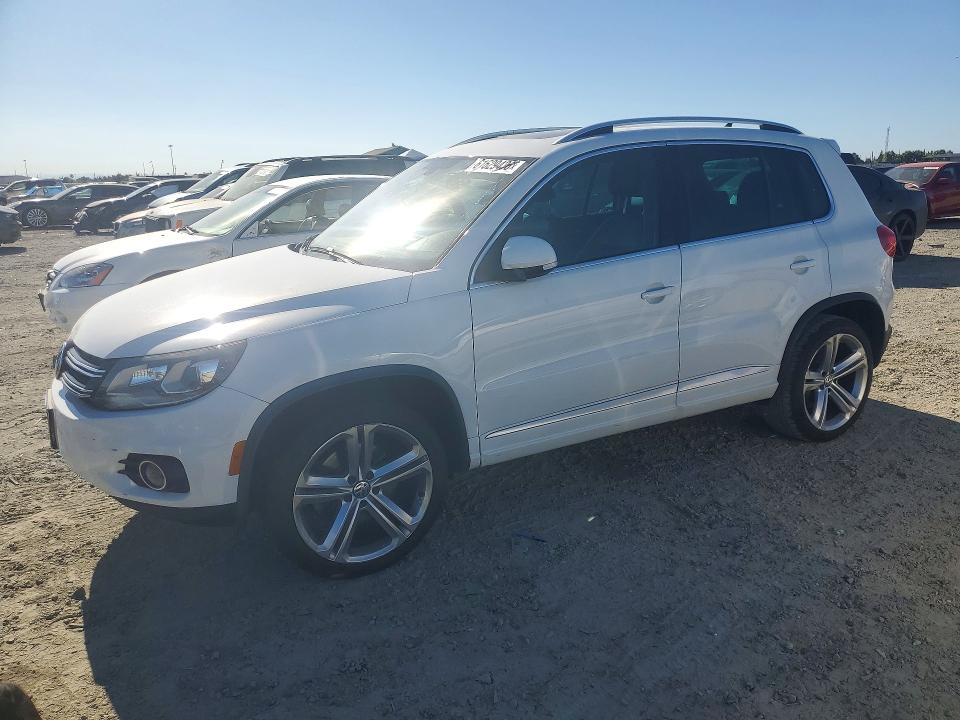 2014 Volkswagen Tiguan VIN WVGAV3AXXEW103879 COPART salvage auction — MECHANICAL, Ca - Dis/Dlr/Exp Only Clean Title, sold $15 on 2026-08-05 (photo 1)