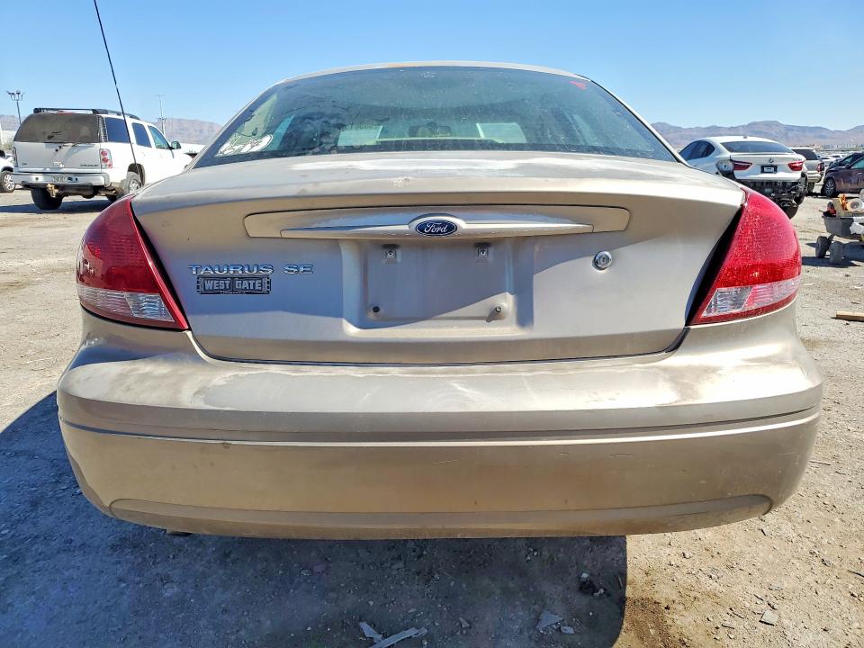 2005 Ford Taurus VIN 1FAFP53295A137316 COPART salvage auction — MINOR DENT/SCRATCHES, Salvage Title, sold $550 on 2026-09-17 (photo 6)