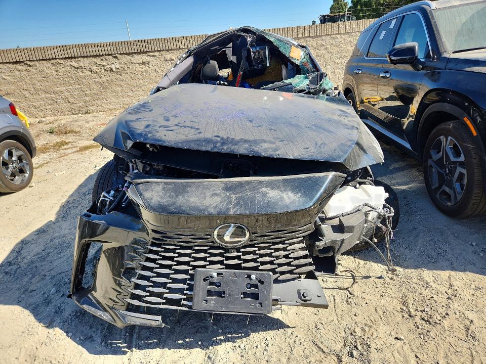 2025 Lexus Rx VIN JTJCJMGA3S2025978 COPART salvage auction — ROLLOVER, CA - SALVAGE CERTIFICATE, sold $3,450 on 2026-09-08 (photo 5)