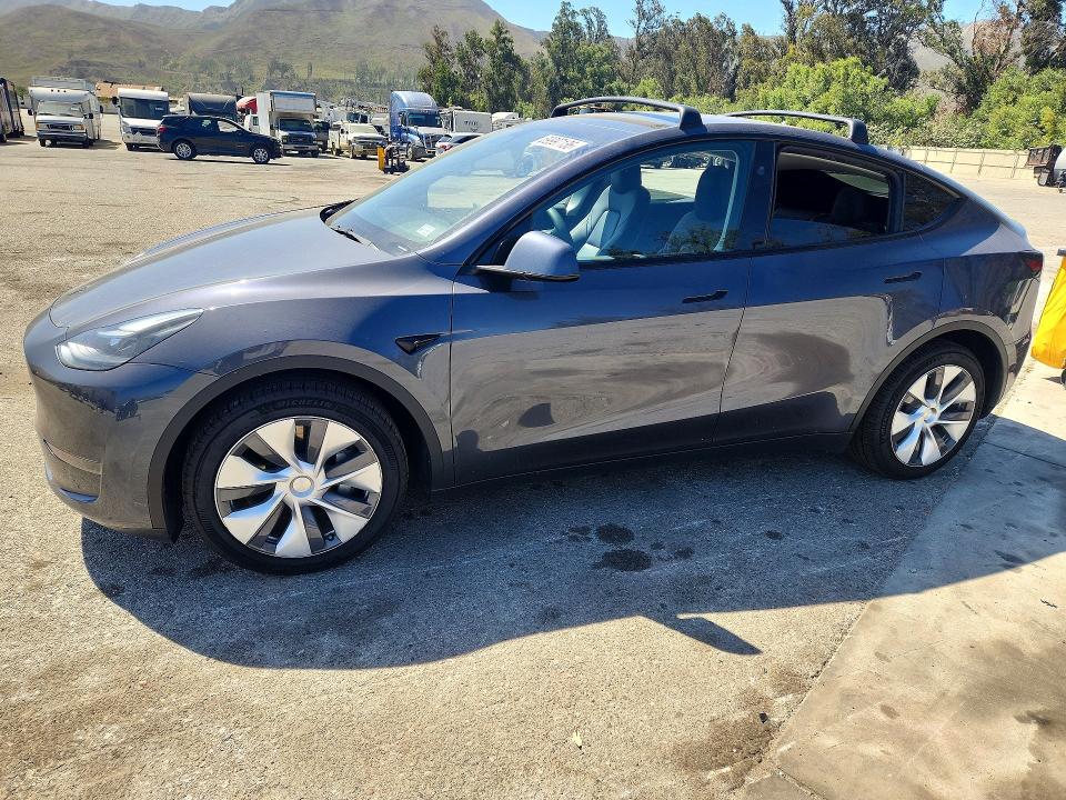 2023 Tesla Model y VIN 7SAYGDEEXPF928052 COPART salvage auction — SIDE, Salvage Title, sold $14,500 on 2026-07-28 (photo 1)