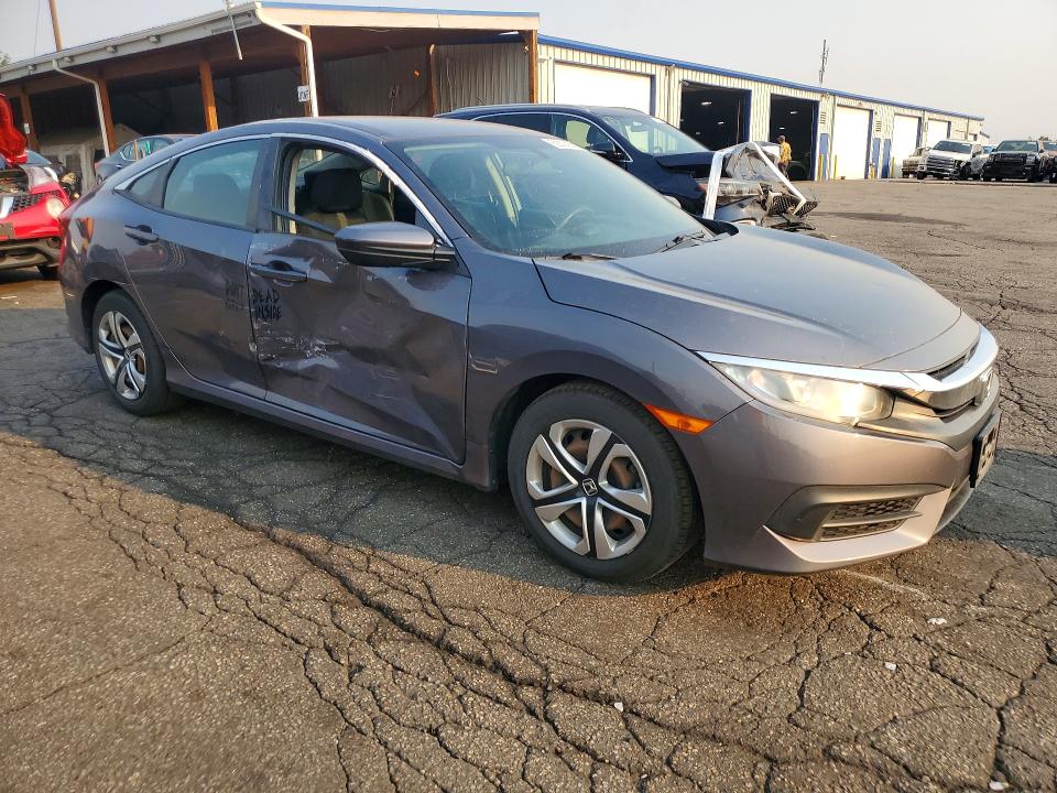 2016 Honda VIN 19XFC2F50GE011288 COPART salvage auction — SIDE, Co - Public - Salvage Title, sold $3,150 on 2026-07-09 (photo 4)
