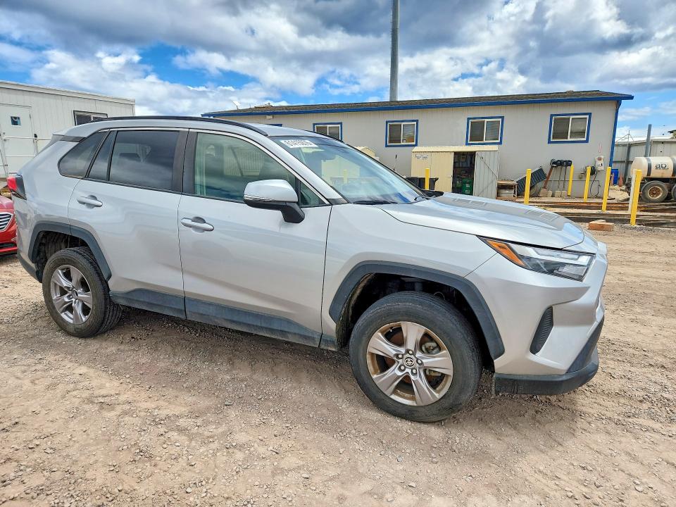 2023 Toyota Rav4 VIN JTMW1RFV2PJ025677 COPART salvage auction — WATER/FLOOD, HI - CERTIFICATE OF SALVAGE, sold $10,100 on 2026-07-27 (photo 4)