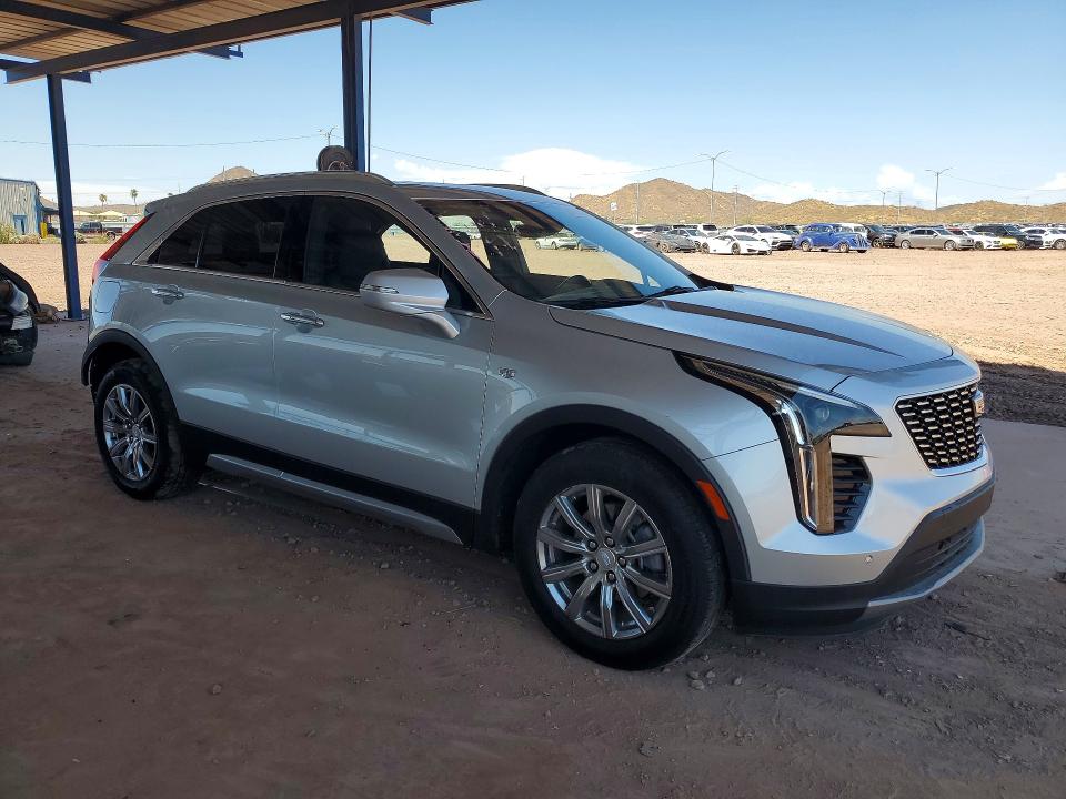 2021 Cadillac Xt4 VIN 1GYFZCR40MF011696 COPART salvage auction — SIDE, Az - Cert Of Title - Salvage, sold $7,600 on 2026-09-03 (photo 4)