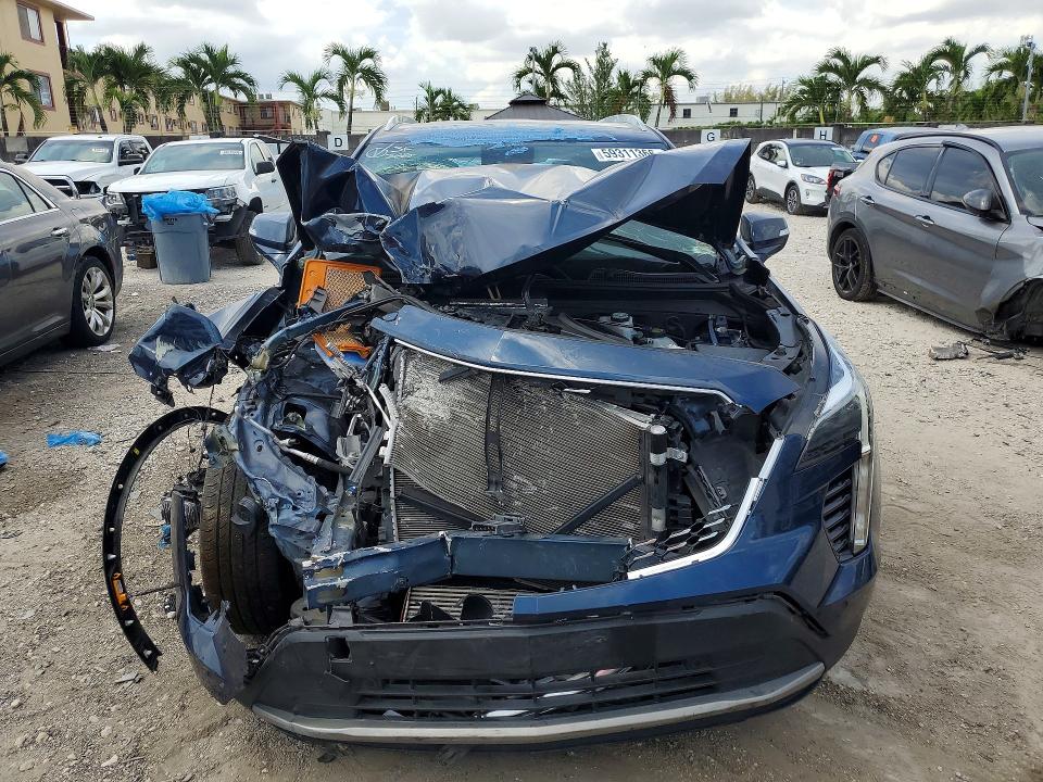 2021 Cadillac Xt4 VIN 1GYFZCR43MF028086 COPART salvage auction — FRONT END, Fl - Certificate Of Destruction, sold $2,250 on 2026-07-09 (photo 5)
