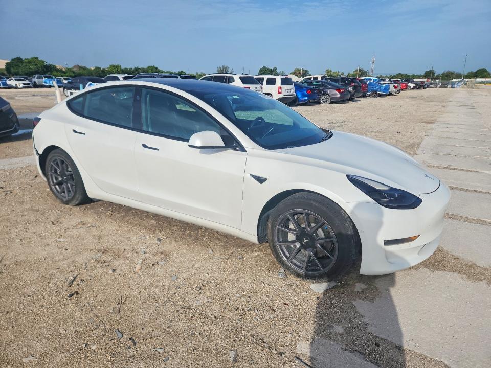 2021 Tesla Model 3 VIN 5YJ3E1EBXMF915038 COPART salvage auction — REAR END, Fl - Cert Of Title Slvg Rebuildable, sold $6,200 on 2026-07-28 (photo 4)