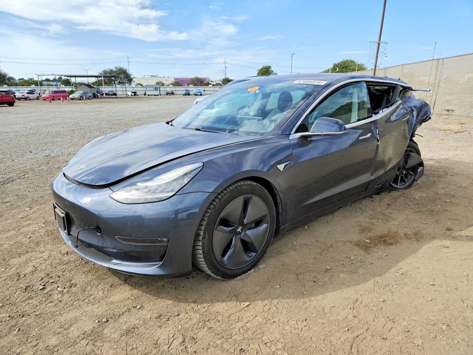 2017 Tesla Model 3 VIN 5YJ3E1EA5HF001261 COPART salvage auction — REAR END, Salvage Title, sold $2,500 on 2026-09-01 (photo 1)