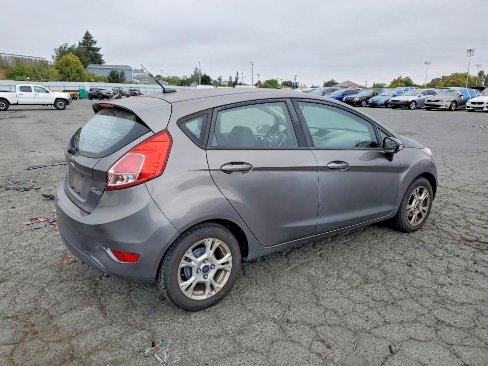2014 Ford Fiesta VIN 3FADP4EJ8EM125313 COPART salvage auction — MINOR DENT/SCRATCHES, Ca - Dis/Dlr/Exp Only Clean Title, sold $425 on 2026-07-10 (photo 3)