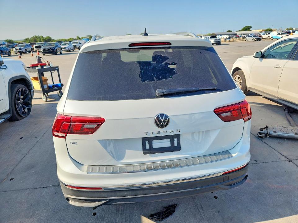 2023 Volkswagen Tiguan VIN 3VVNB7AX7PM101937 COPART salvage auction — SIDE, TX - SALVAGE VEHICLE TITLE (P), sold $10,600 on 2026-08-20 (photo 6)