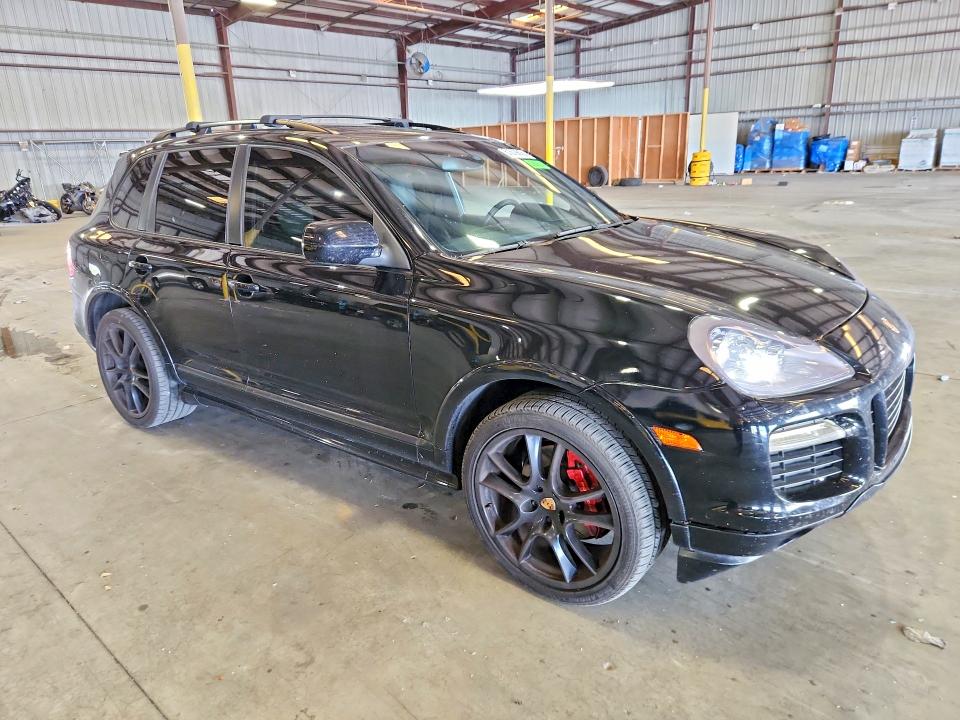 2009 Porsche Cayenne VIN WP1AD29P89LA60123 COPART salvage auction — NORMAL WEAR, Tn - Salvage Cert-Rebuilt Vehicle, sold $1,250 on 2026-07-27 (photo 4)