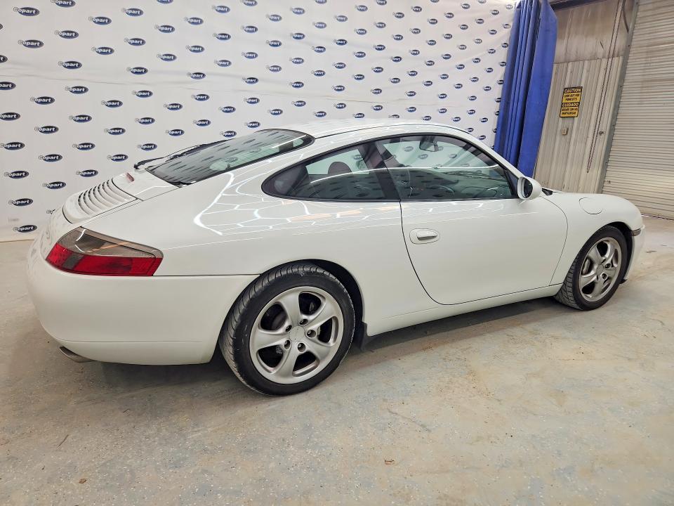 1999 Porsche 911 VIN WP0ZZZ99ZXS603275 COPART salvage auction — MINOR DENT/SCRATCHES, Tx - Certificate Of Title, sold $7,700 on 2026-08-04 (photo 3)