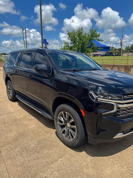 2023 Chevrolet Suburban VIN 1GNSKBKD0PR149617 COPART salvage auction — NORMAL WEAR, Tx - Cert Of Title-Rebuilt Salvage (P), sold $16,100 on 2026-07-28 (photo 2)