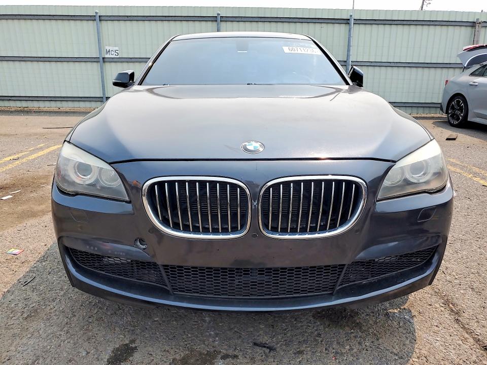 2013 BMW 7er VIN WBAYE4C58DD136987 COPART salvage auction — MINOR DENT/SCRATCHES, Fl - Cert Of Title Slvg Rebuildable, sold $2,950 on 2026-07-24 (photo 5)