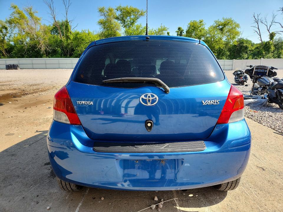 2009 Toyota Yaris VIN JTDJT903395241898 COPART salvage auction — FRONT END, Wi - Certificate Of Title, sold $400 on 2026-07-27 (photo 6)