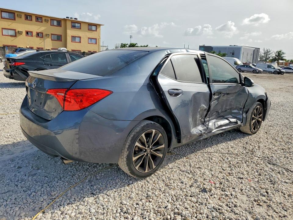 2017 Toyota Corolla VIN 5YFBURHE8HP616757 COPART salvage auction — SIDE, Fl - Cert Of Title Slvg Rebuildable, sold $2,100 on 2026-07-28 (photo 3)