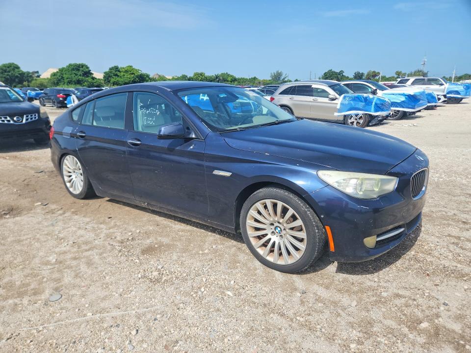 2011 BMW 5 series VIN WBASN2C57BC201471 COPART salvage auction — MINOR DENT/SCRATCHES, FL - CERTIFICATE OF TITLE, sold $250 on 2026-07-21 (photo 4)