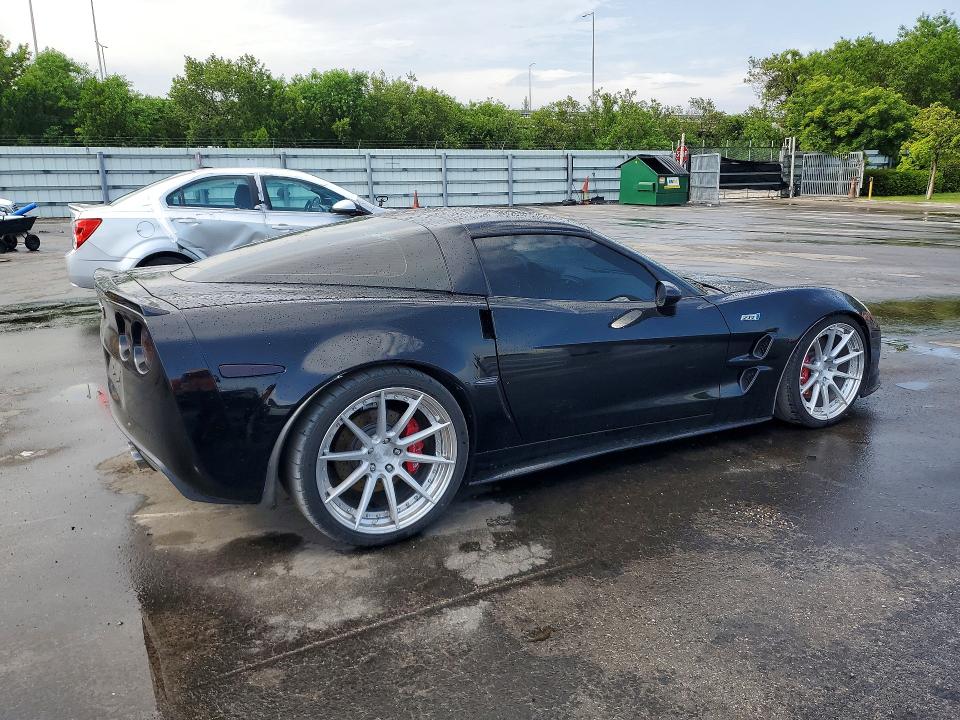 2009 Chevrolet Corvette VIN 1G1YY26W695109574 COPART salvage auction — NORMAL WEAR, FL - CERT OF TITLE-REBUILT, sold $15,100 on 2026-07-29 (photo 3)