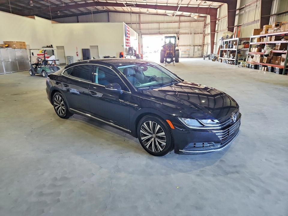 2019 Volkswagen Arteon VIN WVWAR7AN4KE028791 COPART salvage auction — WATER/FLOOD, Fl - Cert Of Title-Slvg Rebld Flood, sold $7,700 on 2026-08-10 (photo 4)