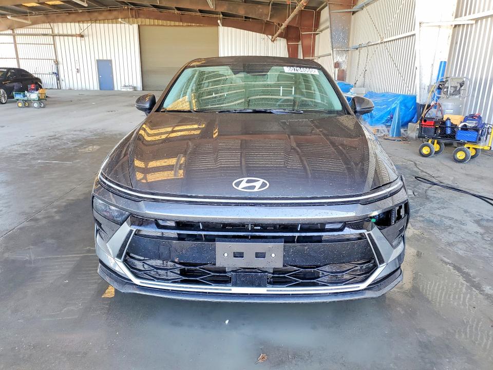 2026 Hyundai Sonata hybrid VIN KMHL24JJ0TA157558 COPART salvage auction — FRONT END, OR - CERTIFICATE OF TITLE (P), sold $11,000 on 2026-07-15 (photo 5)