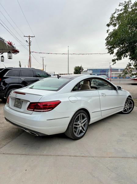2015 Mercedes-benz E-klasse VIN WDDKJ6FB8FF293918 COPART salvage auction — MINOR DENT/SCRATCHES, CA - CERTIFICATE OF TITLE (P), sold $1,800 on 2026-07-31 (photo 4)