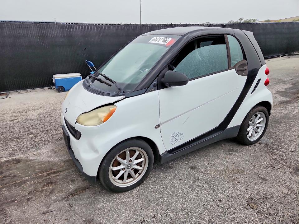 2009 Smart Fortwo VIN WMEEJ31X39K210210 COPART salvage auction — MINOR DENT/SCRATCHES, FL - CERTIFICATE OF TITLE (P), sold $900 on 2026-07-23 (photo 1)