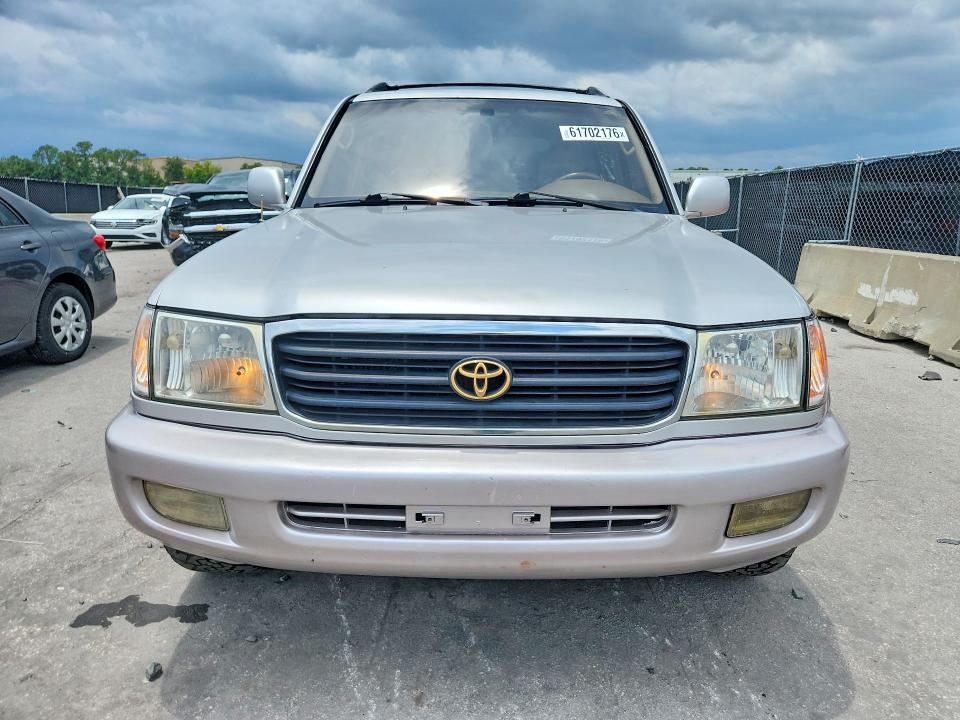 1999 Toyota Land cruiser VIN JT3HT05J5X0027141 COPART salvage auction — MINOR DENT/SCRATCHES, FL - CERTIFICATE OF TITLE (P), sold $3,750 on 2026-07-30 (photo 5)