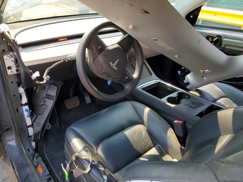 2023 Tesla Model y VIN 7SAYGDEF4PA049300 COPART salvage auction — ALL OVER, TX - DIS/DLR/EXP ONLY CLEAN TITLE (P), sold $7,700 on 2026-07-30 (photo 8)