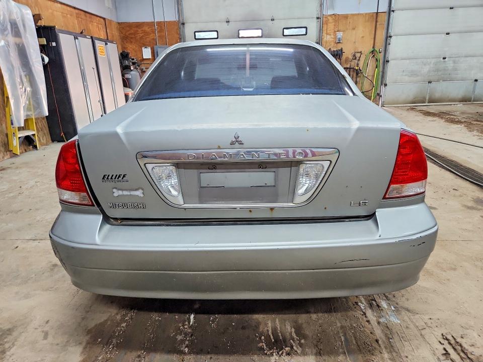 2002 Mitsubishi Diamante VIN 6MMAP67P12T017421 COPART salvage auction — SIDE, Mi - Certificate Of Title, sold $70 on 2026-08-19 (photo 6)