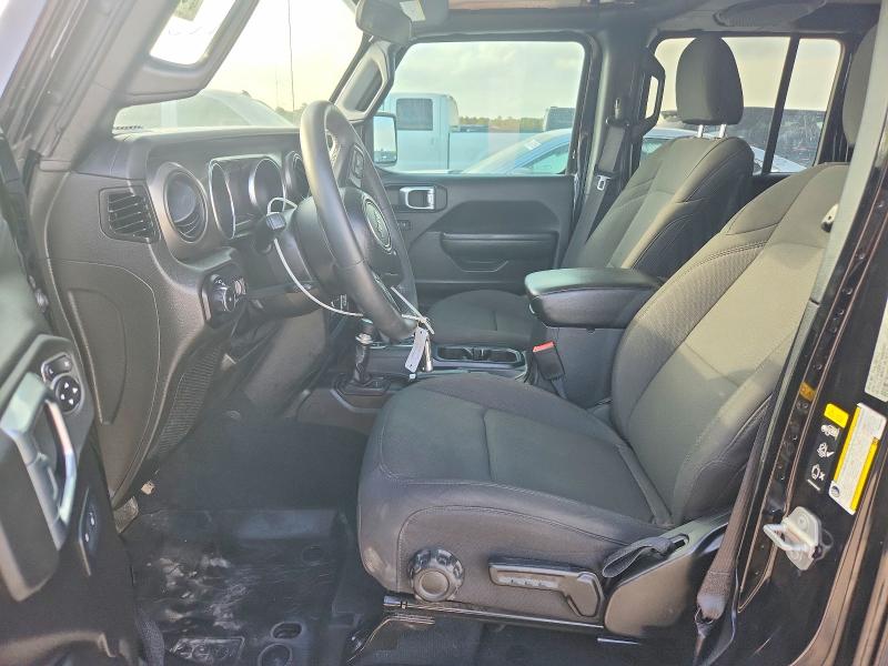 2023 Jeep Wrangler / VIN 1C4HJXDG4PW657343 COPART salvage auction — REAR END, Tx - Salvage Vehicle Title, sold $17,700 on 2026-07-28 (photo 7)