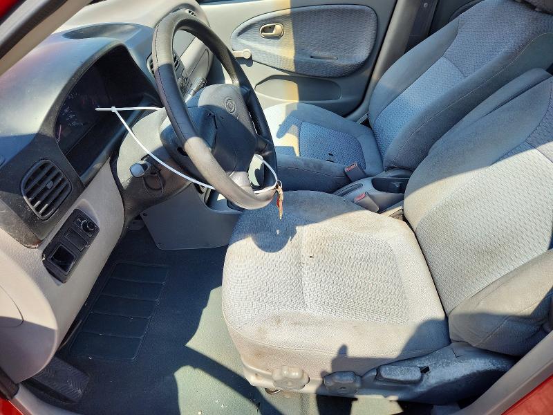 2002 Kia Rio VIN KNADC123926094298 COPART salvage auction — REAR END, TX - CERTIFICATE OF TITLE, sold $575 on 2026-07-09 (photo 7)