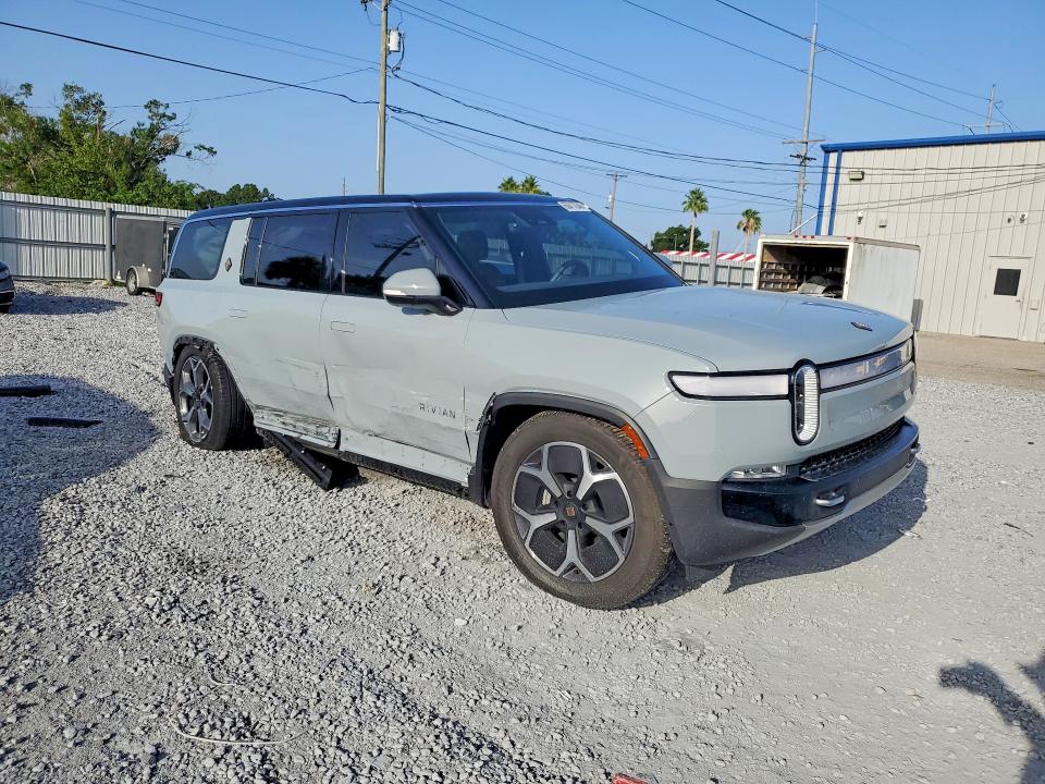 2024 Rivian R1s VIN 7PDSGBBA2RN037260 COPART salvage auction — SIDE, Fl - Cert Of Title Slvg Rebuildable, sold $22,200 on 2026-08-14 (photo 4)