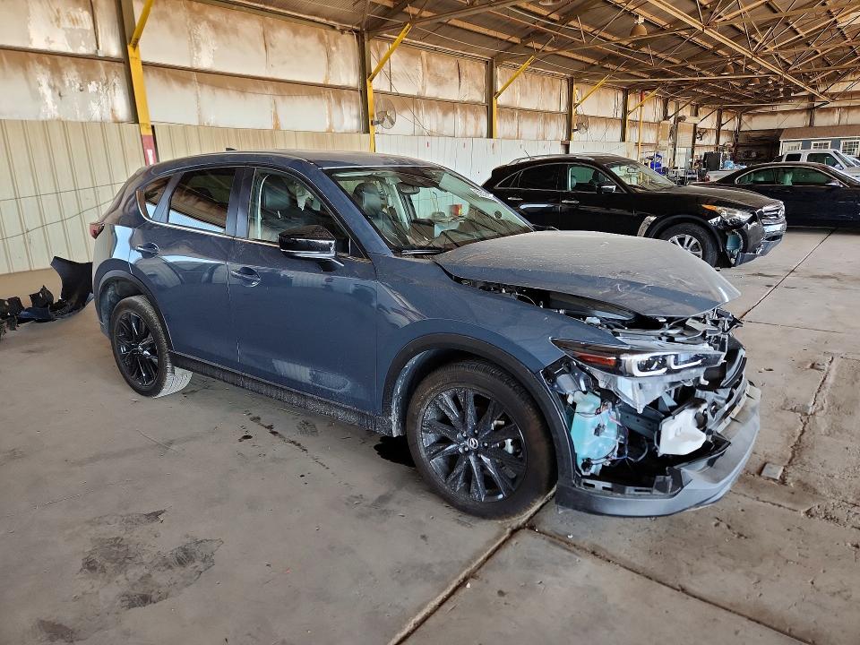 2025 Mazda Cx-5 VIN JM3KFBCM6S0687304 COPART salvage auction — ALL OVER, AZ - CERT OF TITLE - SALVAGE (P), sold $3,700 on 2026-07-08 (photo 4)