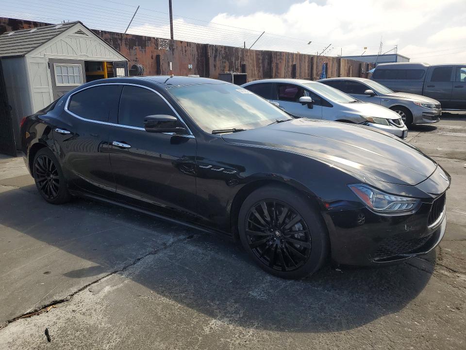 2016 Maserati Ghibli VIN ZAM57RSA7G1187524 COPART salvage auction — REAR END, TX - DIS/DLR/EXP ONLY SALVAGE TITLE, sold $1,100 on 2026-07-31 (photo 4)