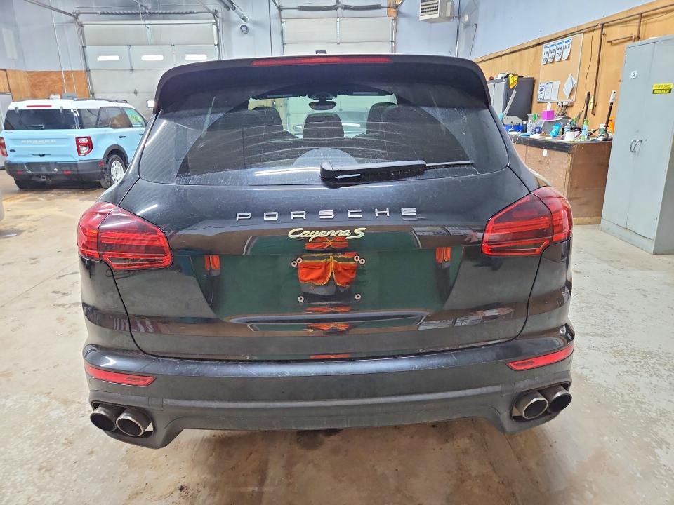 2016 Porsche Cayenne VIN WP1AE2A21GLA62466 COPART salvage auction — WATER/FLOOD, MI - CERT OF TITLE-FLOOD VEHICLE, sold $7,600 on 2026-08-12 (photo 6)