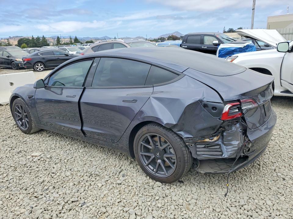 2021 Tesla Model 3 VIN 5YJ3E1EAXMF998770 COPART salvage auction — REAR END, Ca - Salvage Certificate, sold $7,200 on 2026-07-14 (photo 2)