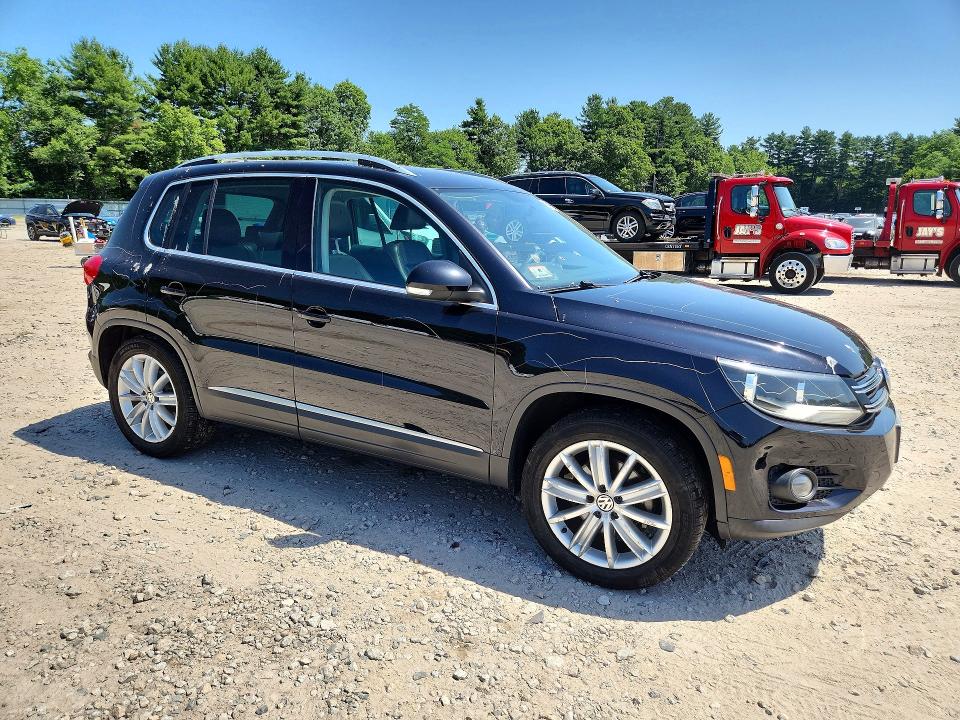 2013 Volkswagen Tiguan VIN WVGBV3AX8DW074661 COPART salvage auction — VANDALISM, Ma - Cert Of Title-Reconstrctd Coll, sold $600 on 2026-07-27 (photo 4)