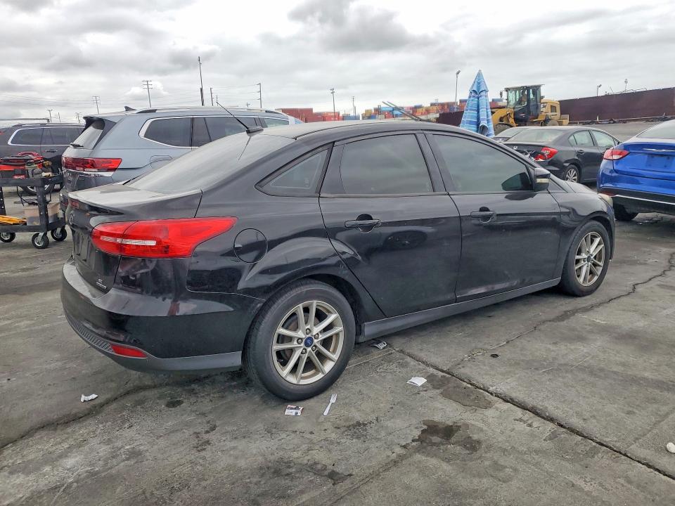 2016 Ford Focus VIN 1FADP3F21GL291243 COPART salvage auction — NORMAL WEAR, Ca - Dis/Dlr/Exp Only Clean Title, sold $375 on 2026-07-10 (photo 3)